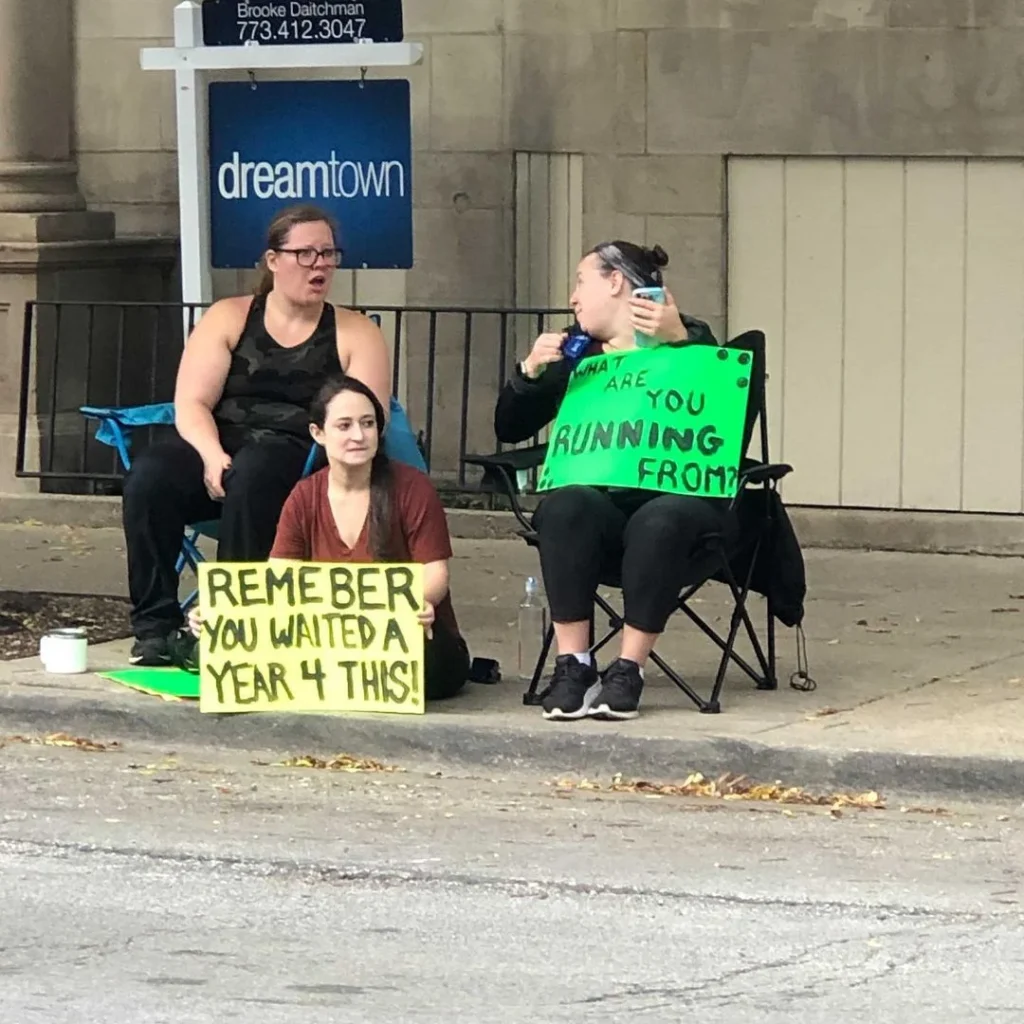 Person holding a fun marathon side