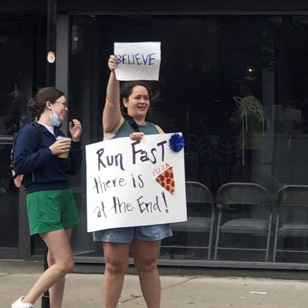 Person holding a fun marathon side