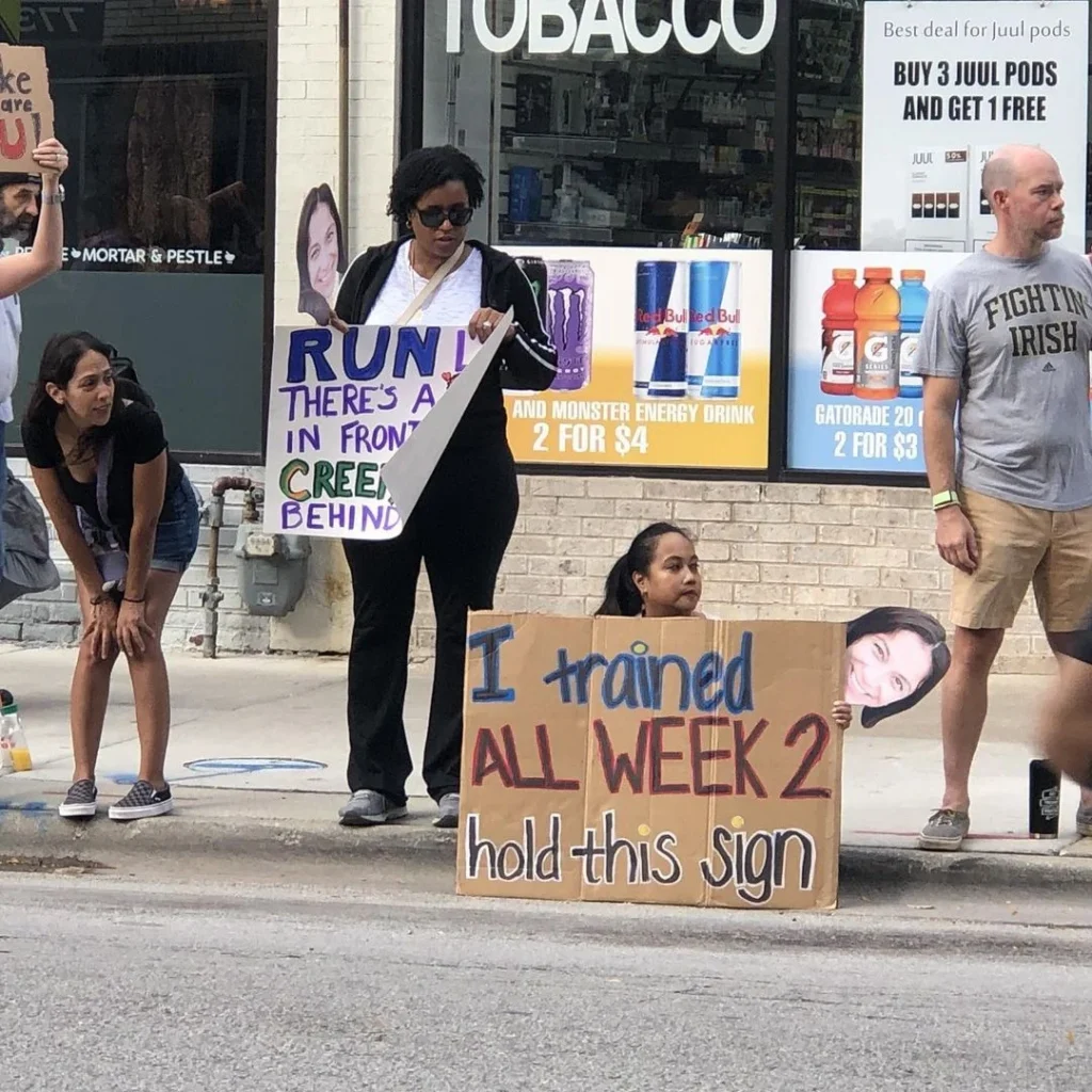 Person holding a fun marathon side