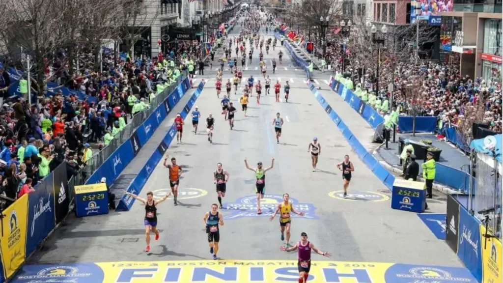 Runners crossing the finish line of the Boston Marathon