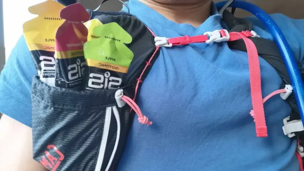 Marathon gels being carried in hydration pack front pocket