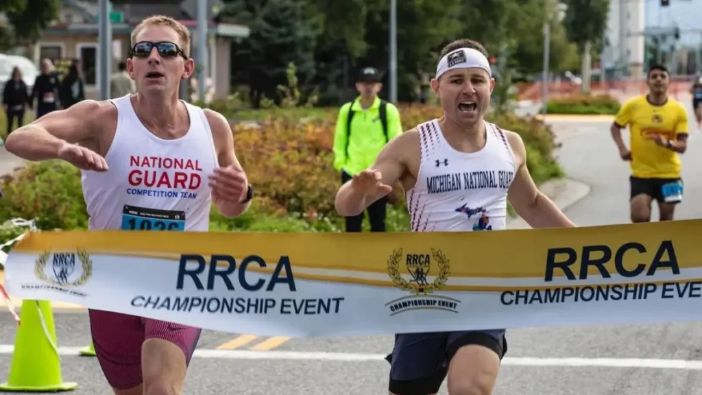 Two runners sprint toward the finish line at the Humpy's Marathon during Anchorage RunFest.