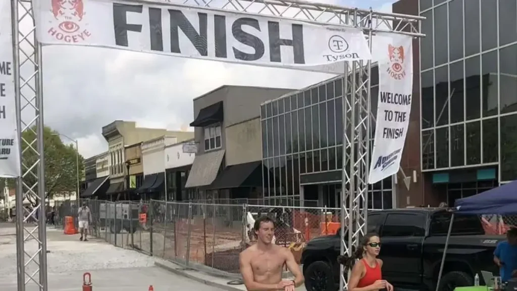 Finishers cross the finish line at the Hogeye Marathon in Fayetteville.