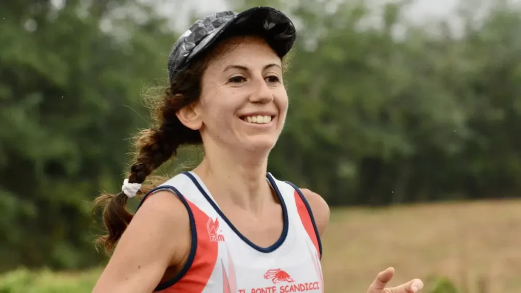 A smiling runner during the Mesa Falls Marathon in Ashton, Idaho.