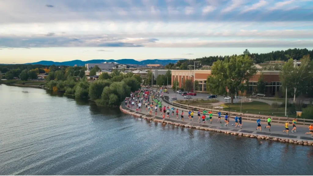 Runners make their way along the river at the Savin Rock Marathon in West Haven.