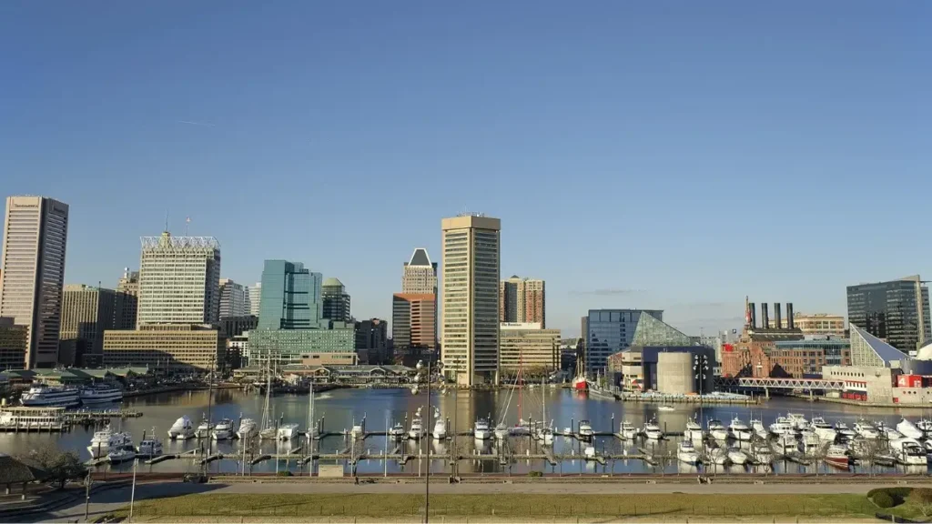 The stunning Baltimore skyline overlooking the harbor, a scenic highlight of the Baltimore Marathon in Maryland.